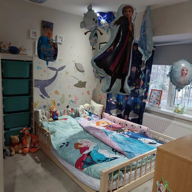 User photo review of Snuglee kids bed with visible premium pine wood finish