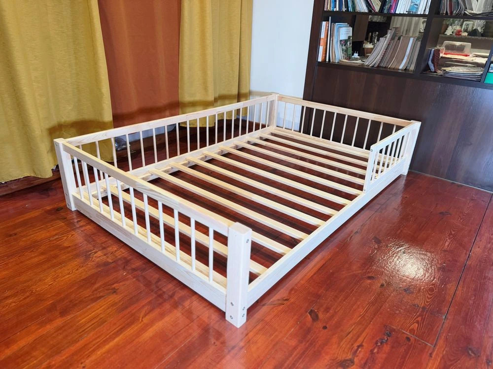 Wooden Montessori bed frame for kids in soft neutral nursery decor