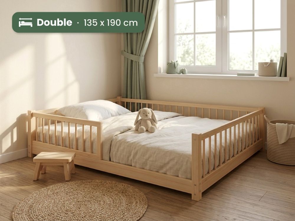 A light natural wood double bed with built-in side rails, shown in a bright child's bedroom. A green text overlay in the top left reads 'Double - 135 x 190 cm'.