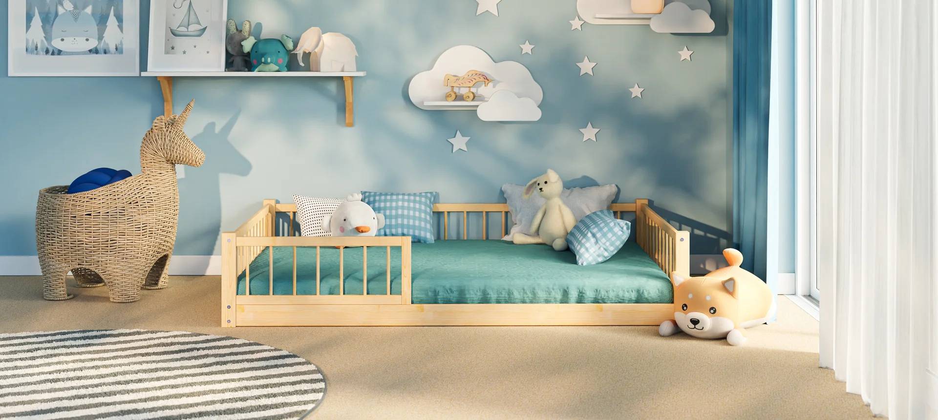 Snuglee natural pine wood Montessori floor bed with safety guard rails in a pastel blue kids nursery, styled with cloud wall shelves, star decor, and plush toys